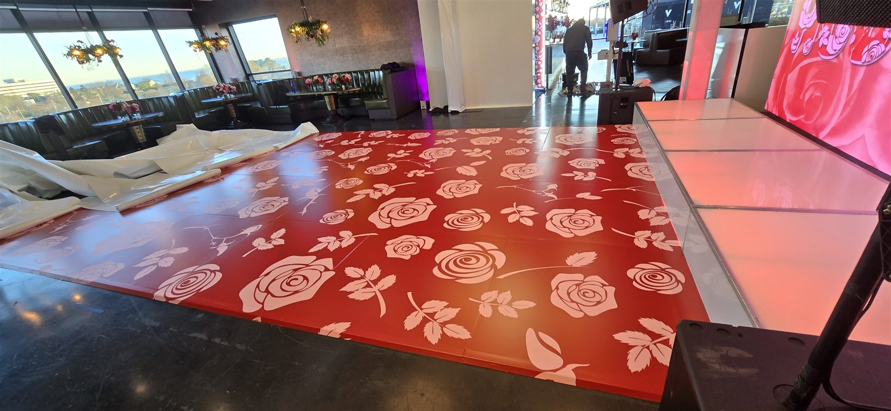 Custom-printed rose pattern dance floor by Adicora, wide view
