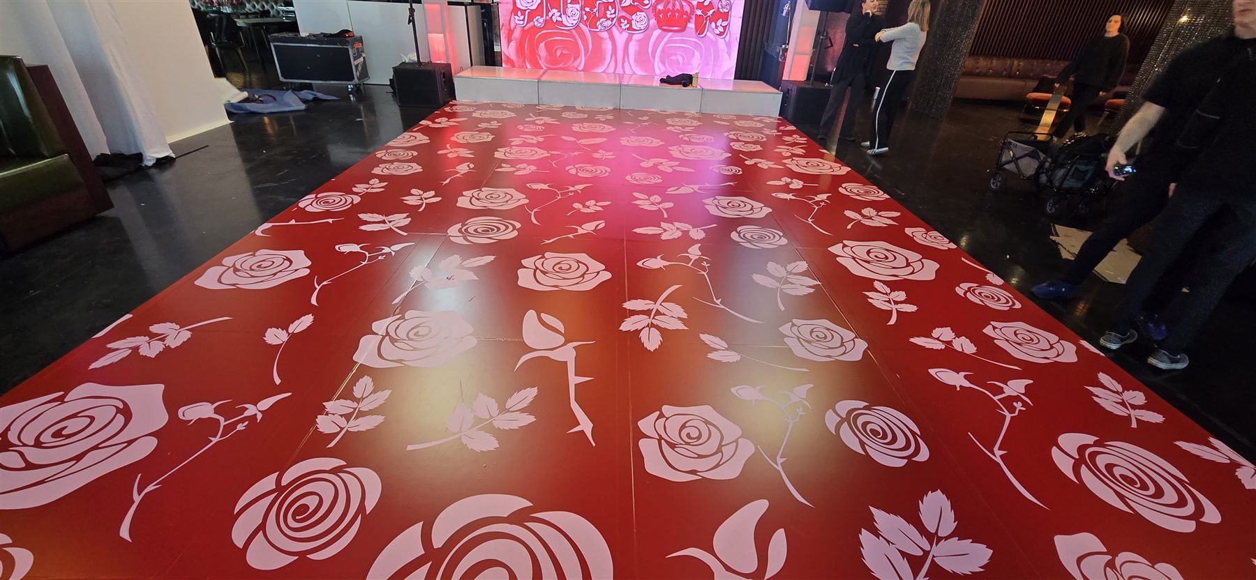 Custom-printed rose pattern dance floor by Adicora, detail